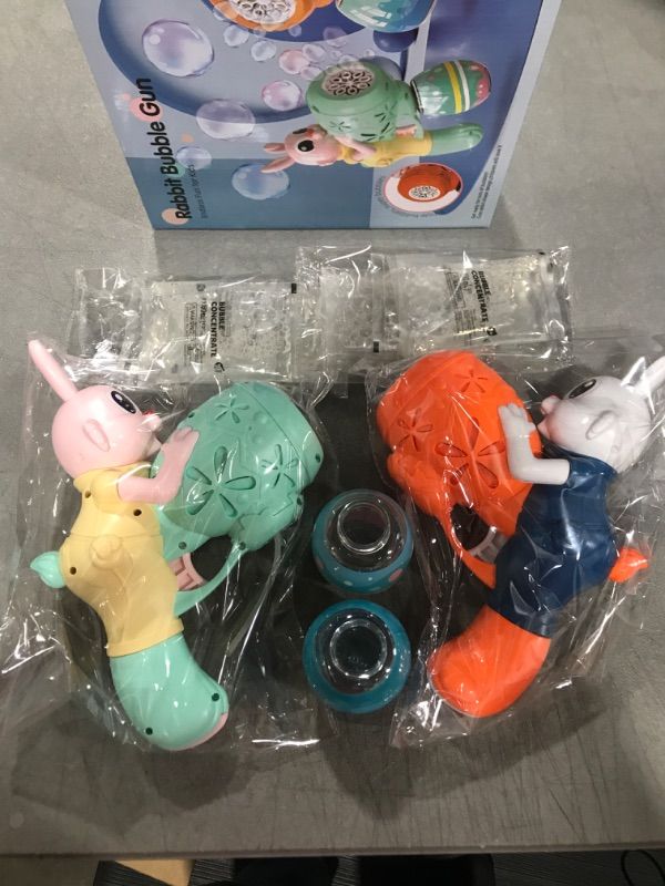 Photo 2 of IFLOVE Bubble Guns Rabbit Bubble Machine for Toddlers,2pcs Automatic Bubble Blower with 10 Bubble Solutions for Kids, Summer Party Outdoor Toys,Birthday Gift for Age 3 4 5 6 7 8 Years Old Boys Girls