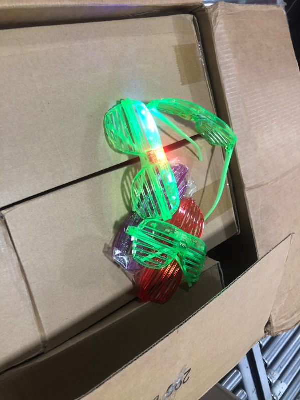 Photo 1 of box of party light up glasses 