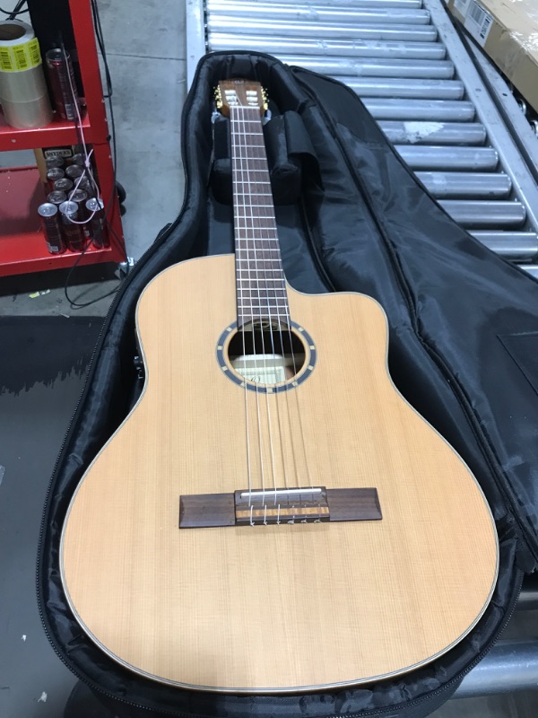 Photo 2 of Ortega Guitars 6 String Family Series Pro Solid Top Slim Neck Acoustic-Electric Nylon Classical Guitar w/Bag, Right (RCE131SN)