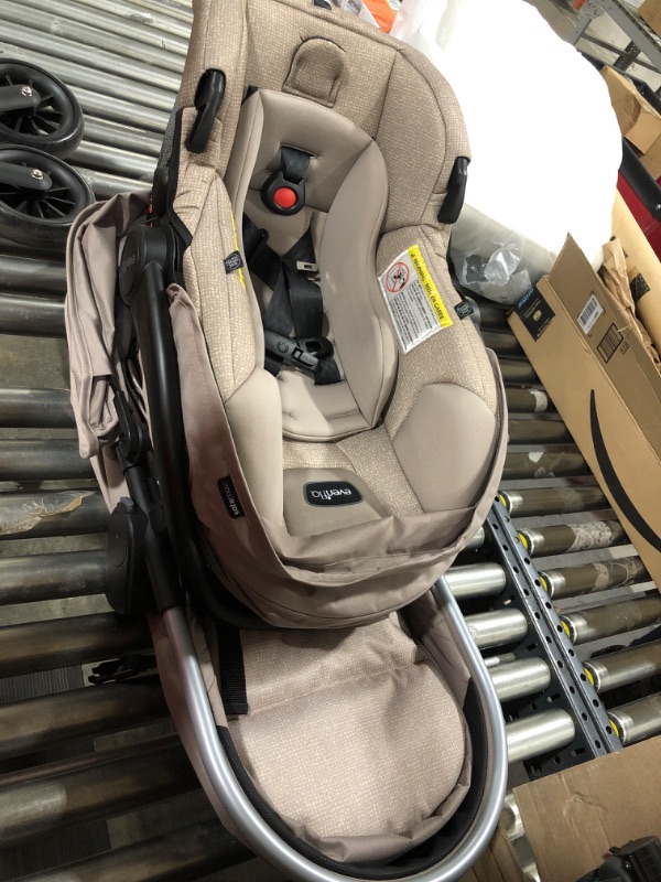 Photo 2 of Evenflo Pivot Modular Travel System with LiteMax Infant Car Seat with Anti-Rebound Bar (Desert Tan)
