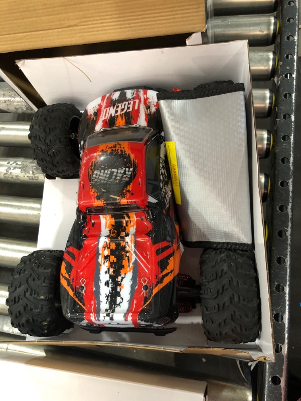 Photo 2 of LAEGENDARY Fast RC Cars for Adults and Kids - 4x4, Off-Road Remote Control Car - Battery-Powered, Hobby Grade, Waterproof Monster RC Truck - Toys and Gifts for Boys, Girls and Teens Red - Yellow Red Yellow Up to 31 mph