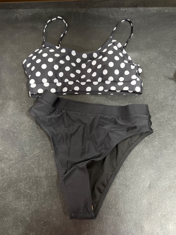 Photo 1 of BLACK AND WHITE TWO PIECE CHEEKY SWIM WEAR SIZE M