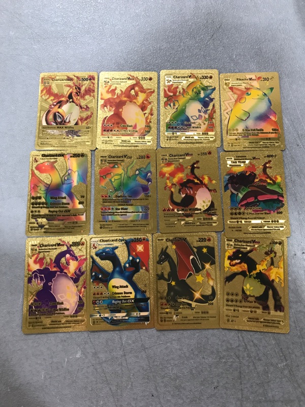 Photo 1 of 12 GOLD POKEMON CARDS 