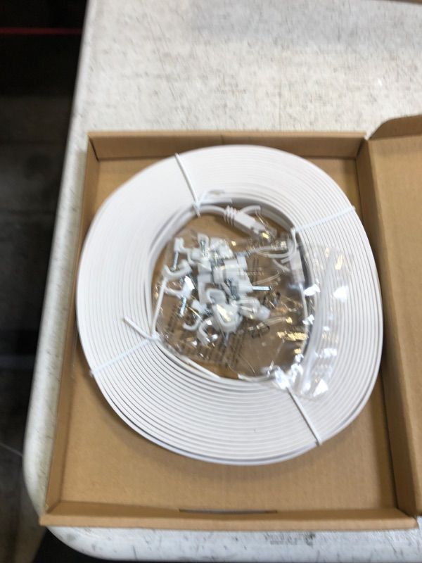 Photo 1 of Amazon Basics Cat 6 Gigabit Ethernet Patch Internet Cable, Flat - 50FT, 1Pack, White - Include 20 Nails 50-Foot White 1