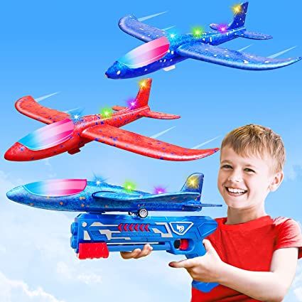 Photo 2 of AMENON 2 Pack LED Flying Airplane Toys with Launcher, Foam Glider Planes Christmas Stocking Stuffers for Kids Outdoor Flying Toys, Catapult Airplanes for 6-12 Years Old Boys Girls Yard Game