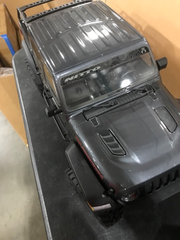 Photo 4 of Axial RC Truck 1/10 SCX10 III Jeep JT Gladiator Rock Crawler with Portals RTR (Batteries and Charger Not Included), Gray, AXI03006BT1
