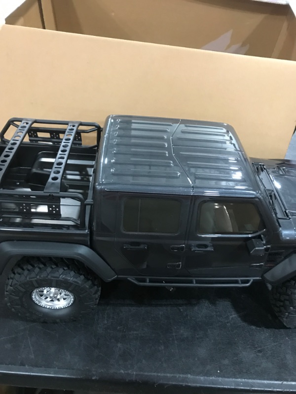 Photo 5 of Axial RC Truck 1/10 SCX10 III Jeep JT Gladiator Rock Crawler with Portals RTR (Batteries and Charger Not Included), Gray, AXI03006BT1
