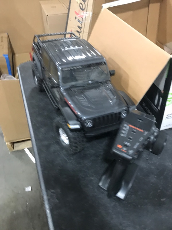 Photo 2 of Axial RC Truck 1/10 SCX10 III Jeep JT Gladiator Rock Crawler with Portals RTR (Batteries and Charger Not Included), Gray, AXI03006BT1
