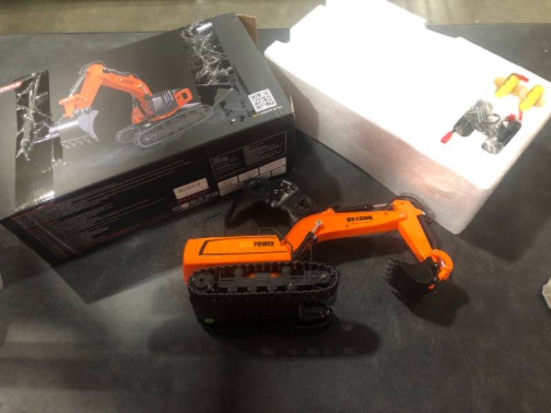 Photo 2 of BEZGAR Remote Control Construction Excavator, RC Toys with 2 Rechargeable Batteries for Kids Age 6 7 8 9 10 11, RC Construction Truck Vehicle Toys with Light for Boys and Girls, TK181