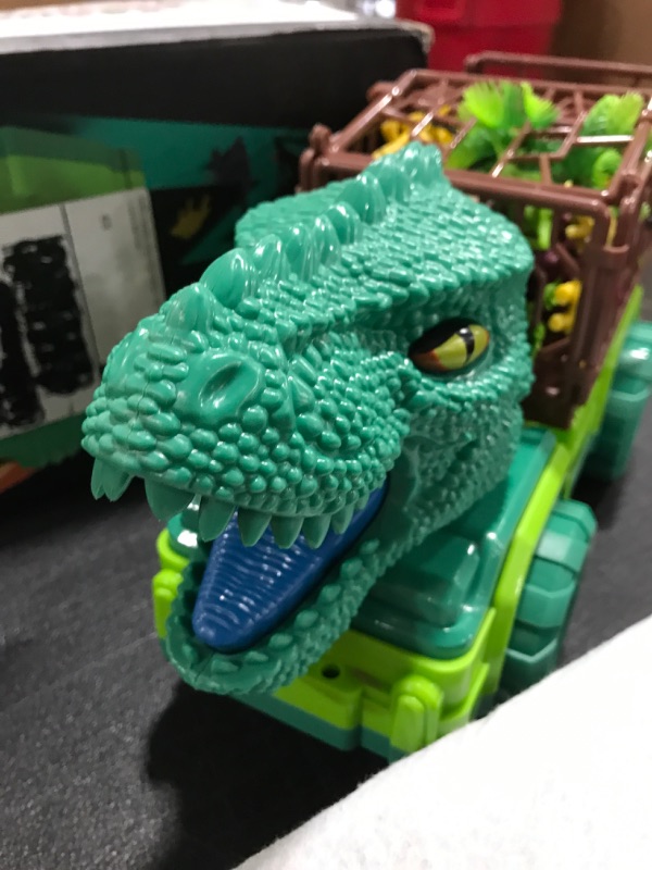 Photo 3 of 25 in 1 New Tyrannosaurus Rex Dinosaur Carrier Truck Set, Toddler Dinosaur Transport Car Toys for Kids 3-5 with Play Mat, 18 Dino Figures, Eggs, Capture Dinosaurs Playset for 3 4 5 6 7+ Year Old Boys Dino truck. OPEN BOX. 