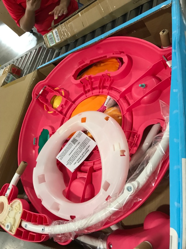 Photo 3 of Fisher-Price Jumperoo Baby Bouncer and Activity Center with Spinning Seat plus Lights Music Sounds and Baby Toys, Pink Petals