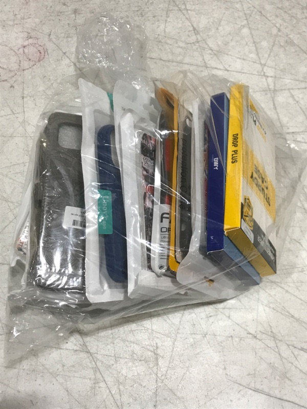 Photo 1 of Bag Lot- Bundle of phone cases, screen protectors (various color, sizes, designs) 