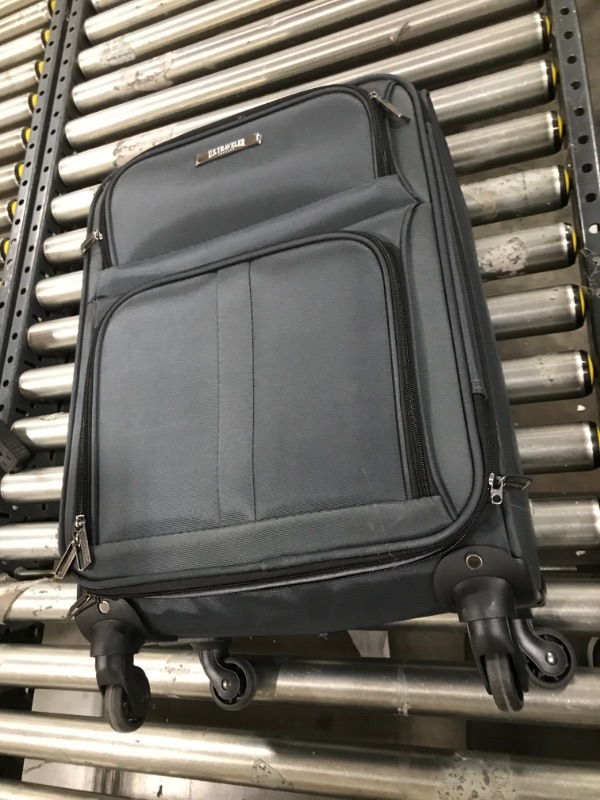 Photo 1 of American Tourister Phenom Softside Carry On Spinner Suitcase

