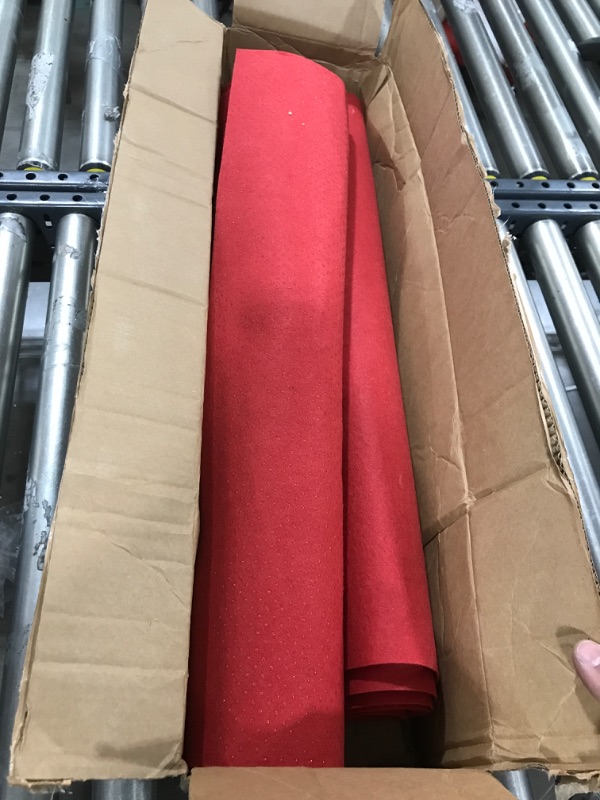 Photo 1 of 2 rolls of red fabric 