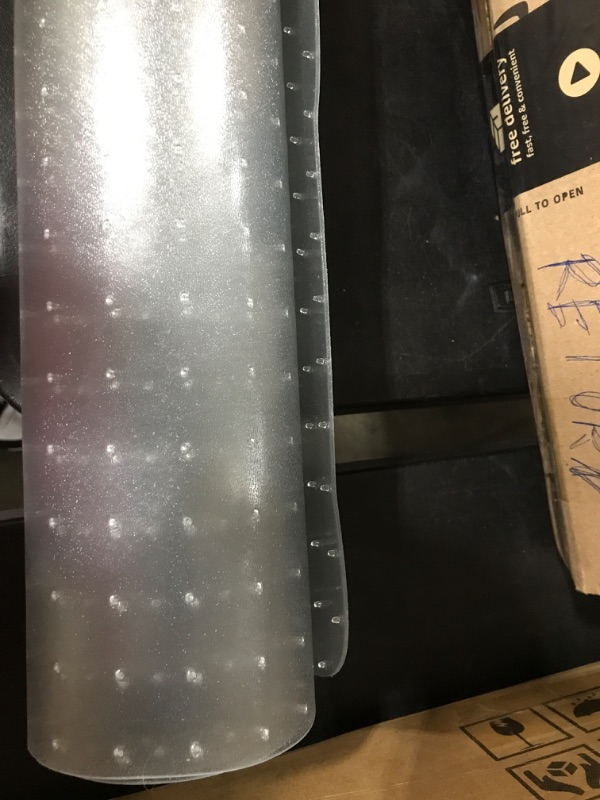 Photo 1 of clear plastic office mat