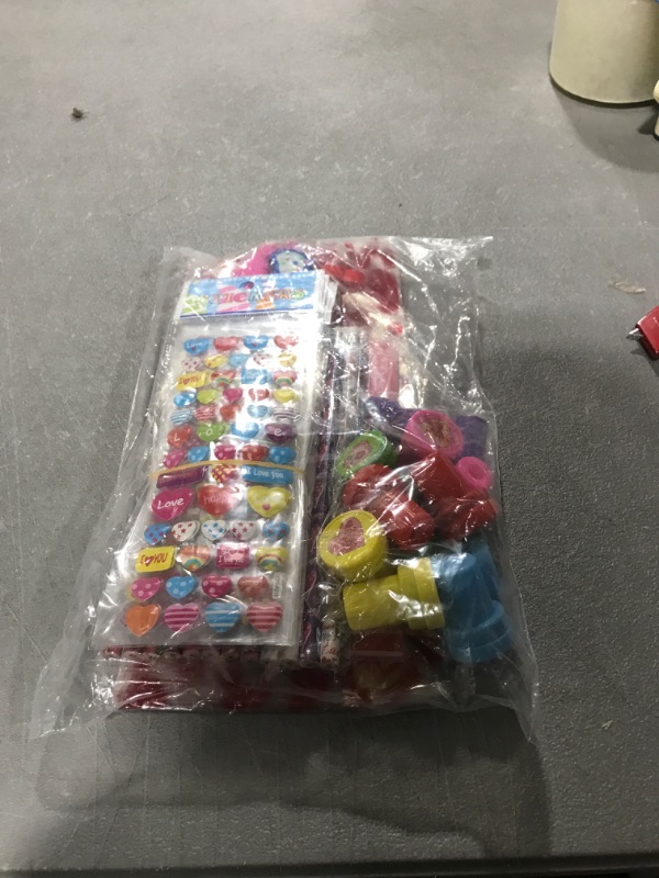 Photo 2 of 102PCS Valentine Stationary Set with Cellophane Treat Bags Valentines Day Gifts for Kids Classroom Exchange Prizes Party Favors with Erasers Stampers Stickers Cards Pencils