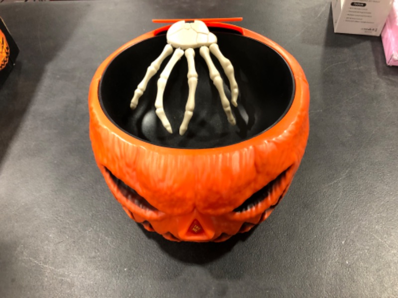 Photo 2 of Animated Jack O Lantern Hand Candy Bowl. 
