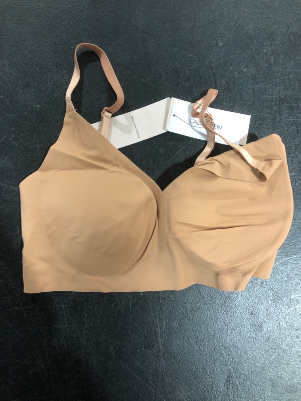 Photo 2 of Calvin Klein Women's Invisibles Comfort Lightly Lined Seamless Wireless Triangle Bralette Bra Small Light Chestnut