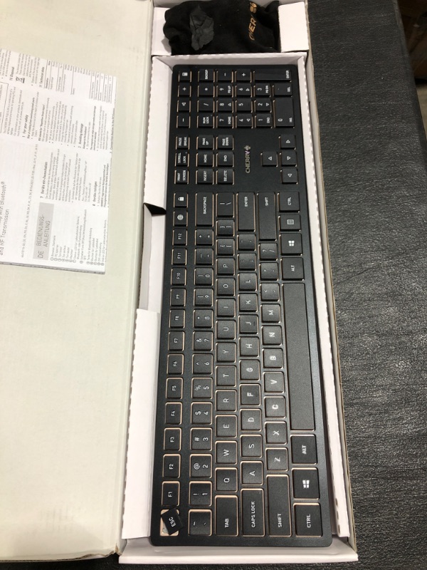 Photo 2 of CHERRY DW 9100 Slim Wireless Keyboard and Mouse Set Combo Rechargeable with SX Scissor Mechanism, Silent keystroke Quiet Typing with Thin Design for Work or Home Office. (Black & Bronze). OPEN BOX. ESC KEY IS LOOSE. 