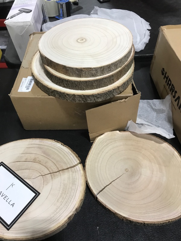 Photo 2 of 5Pcs 10-12" Inch Round Rustic Wood Slices, Unfinished Natural Poplar with Tree Bark, Disc Coasters Wood Coaster for Weddings, Table Centerpieces and Other DIY Projects