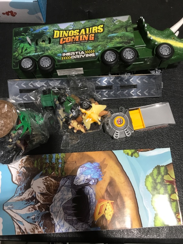 Photo 2 of BLUEJAY 21 Pack Dinosaur Toys for Kids 3-7, Dinosaur Truck with Oversized Dinosaur Map, Flashing Lights, Music and Roaring Sound, Kids Toys with 6 Pull Back Dinosaur Cars, 6 Dinosaur Toys (Green)