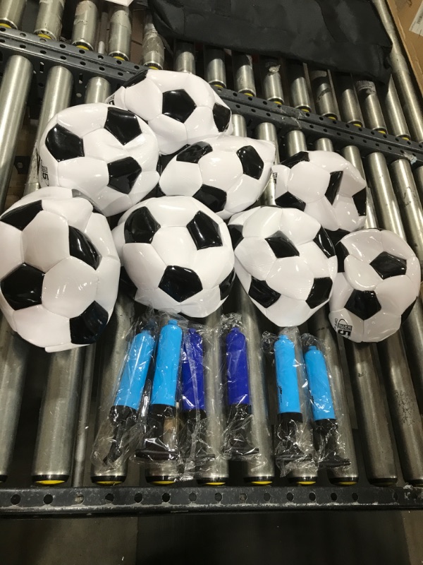 Photo 1 of 8 soccer balls with 6 hand pumps