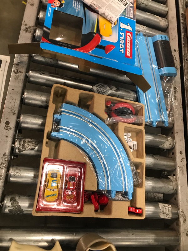 Photo 1 of Carrera First Disney/Pixar Cars - Slot Car Race Track - Includes 2 Cars: Lightning McQueen and Dinoco Cruz - Battery-Powered Beginner Racing Set for Kids Ages 3 Years and Up Disney Cars w/ Spinners