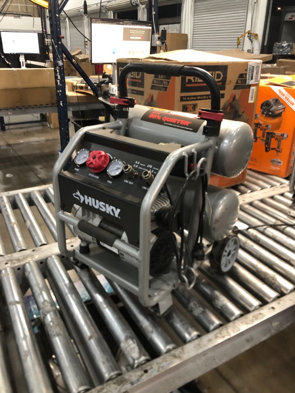 Photo 1 of Husky 4.5 Gal. Portable Electric-Powered Silent Air Compressor