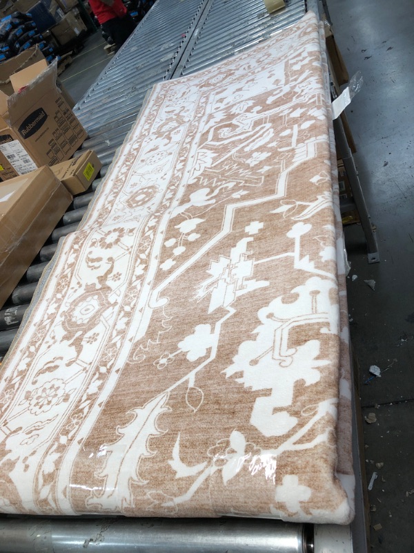 Photo 1 of 10 x 12 feet brown and white pattern area rug 