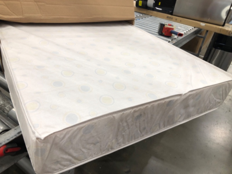 Photo 2 of Delta Children Twinkle Stars Dual Sided - 6" Premium Sustainably Sourced Fiber Core Crib and Toddler Mattress 