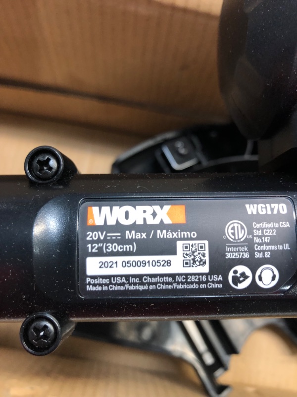 Photo 1 of Worx WG170 GT Revolution 20V 12 Inch Grass Trimmer/Edger/Mini-Mower (Batteries & Charger Included) & WA3578 - PowerShare 20V 4.0Ah, Lithium Ion High Capacity Battery, Orange and Black 2 X 20V 2.0Ah Batteries Included Revolution + Capacity Battery