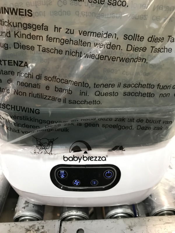 Photo 6 of Baby Brezza Baby Bottle Sterilizer and Dryer Advanced – Electric Steam Sterilization Machine – Universal Sterilizing for All Bottles: Plastic + Glass + Pacifiers + Breast Pump Parts - HEPA Filtration
