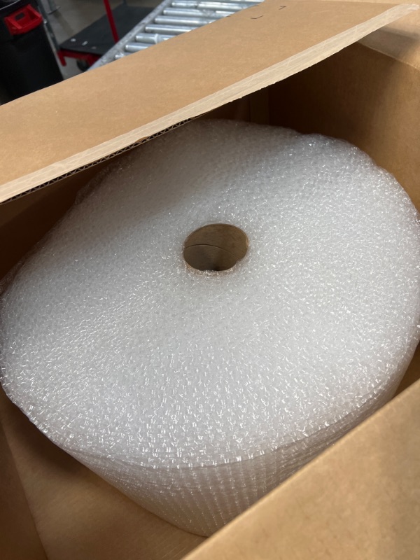 Photo 2 of Amazon Basics Perforated Bubble Cushioning Wrap - Small 3/16", 12-Inch x 175-Foot Long Roll 