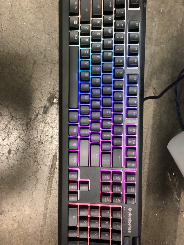 Photo 2 of SteelSeries Apex 3 RGB Gaming Keyboard – 10-Zone RGB Illumination – IP32 Water Resistant – Premium Magnetic Wrist Rest (Whisper Quiet Gaming Switch)