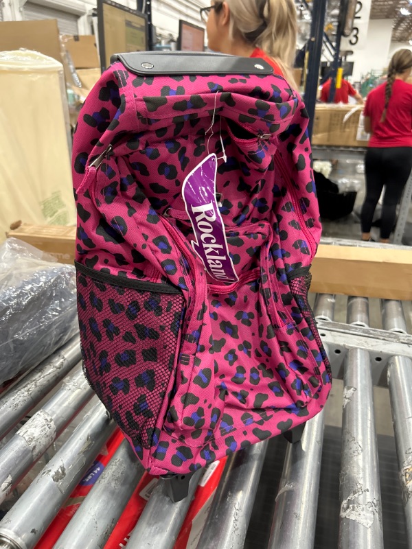 Photo 1 of Rockland Double Handle Rolling Backpack, Magenta Leopard, 17"x13"x10"
