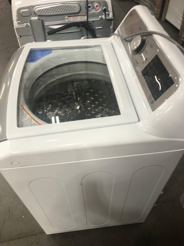 Photo 10 of LG TurboWash3D 5.5-cu ft High Efficiency Impeller Smart Top-Load Washer (White) ENERGY STAR