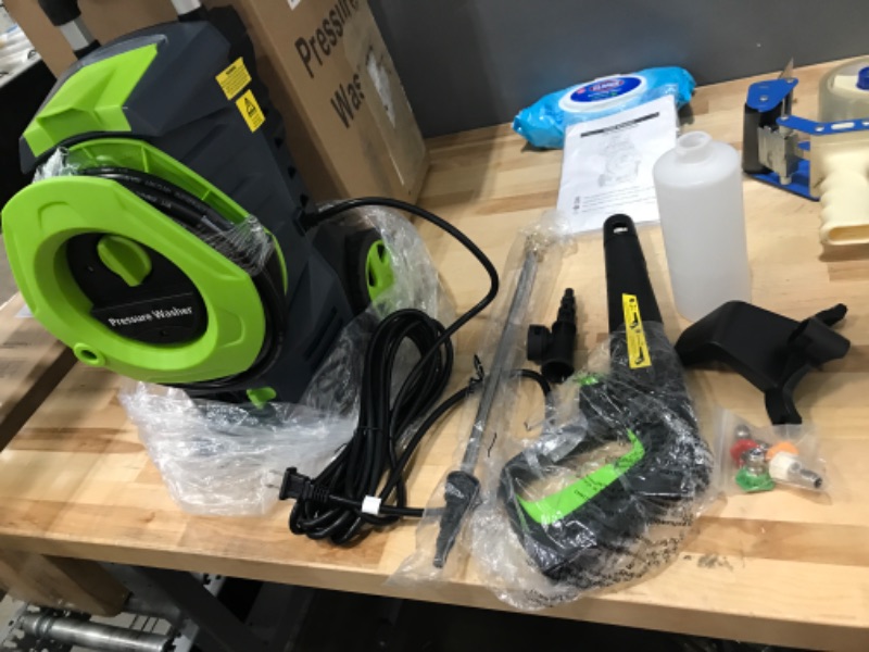 Photo 2 of ***POWERS ON*** Electric Pressure Washer 3500 Max PSI 2.5 GPM High Pressure Washer with 4 Interchangeable Nozzles 25 FT Hose Reel and Foam Box Electric Power Washer for Home Cars Fences Patios Driveways Green