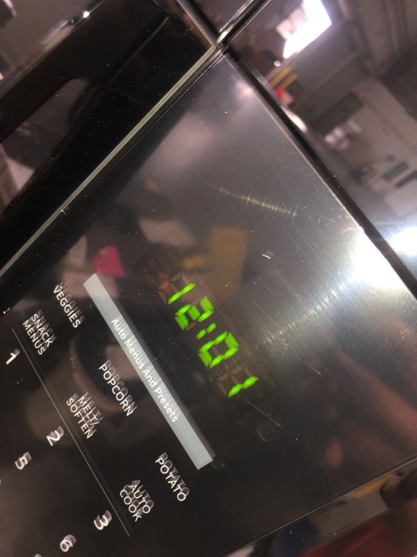 Photo 1 of 1.7 cu. ft. 1000-Watt Over the Range Microwave in Black