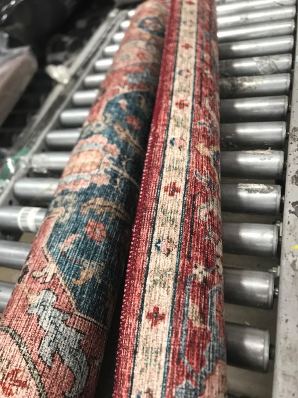 Photo 1 of 3'6" x 5' redish rug 