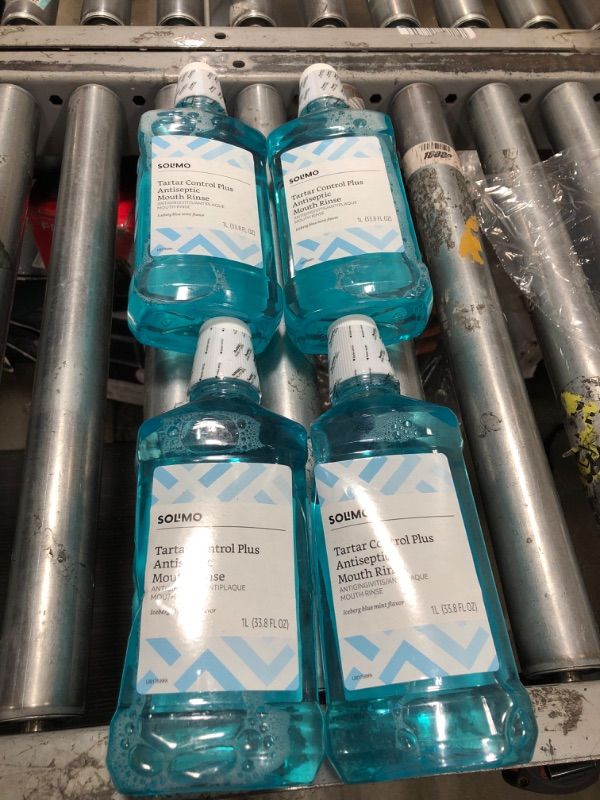 Photo 2 of 4 OF- Amazon Brand - Solimo Tartar Control Plus Antiseptic Mouth Rinse, Iceberg Blue Mint, 1 Liter, 33.8 Fluid Ounces, Pack of 4