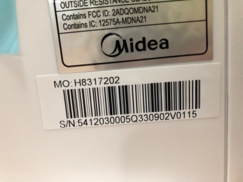 Photo 1 of Midea 10,000 BTU U-Shaped Smart Inverter Window Air Conditioner–Cools up to 450 Sq. Ft., Ultra Quiet with Open Window Flexibility, Works with Alexa/Google Assistant, 35% Energy Savings, Remote Control 10000 BTU AC