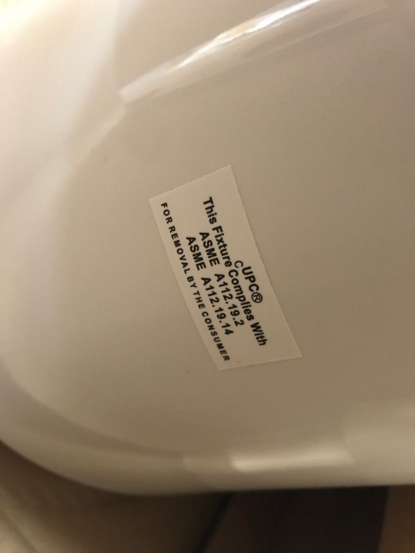 Photo 6 of 2-piece 1.1 GPF/1.6 GPF Dual Flush Round Toilet in White