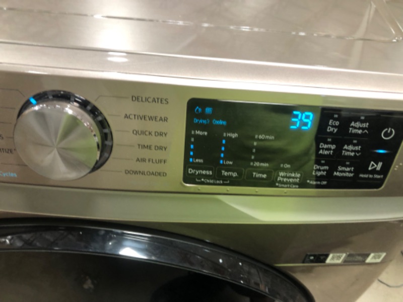 Photo 4 of 7.5 cu. ft. Stackable Vented Gas Dryer with Steam Sanitize+ in Champagne
