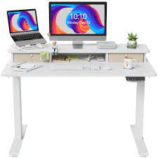 Photo 1 of DAMAGED TABLE CORNERS**FEZIBO Height Adjustable Electric Standing Desk with Double Drawer, 48 x 24 Inch Stand Up Table with Storage Shelf, Sit Stand Desk with Splice Board, White Frame/White Top
