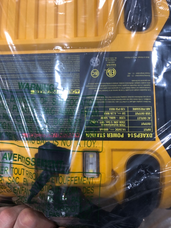 Photo 1 of DEWALT DXAEPS14 1600 Peak Battery Amp 12V Automotive Jump Starter/Power Station with 500 Watt AC Power Inverter, 120 PSI Digital Compressor, and USB Power , Yellow