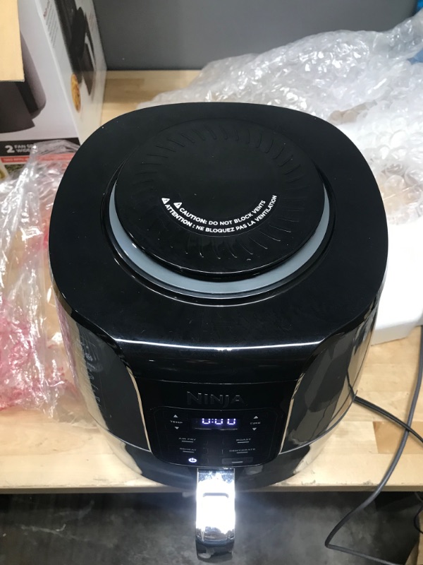 Photo 3 of Ninja AF150AMZ Air Fryer XL, 5.5 Qt. Capacity that can Air Fry, Air Roast, Bake, Reheat & Dehydrate, with Dishwasher Safe, Nonstick Basket & Crisper Plate and a Chef-Inspired Recipe Guide, Grey