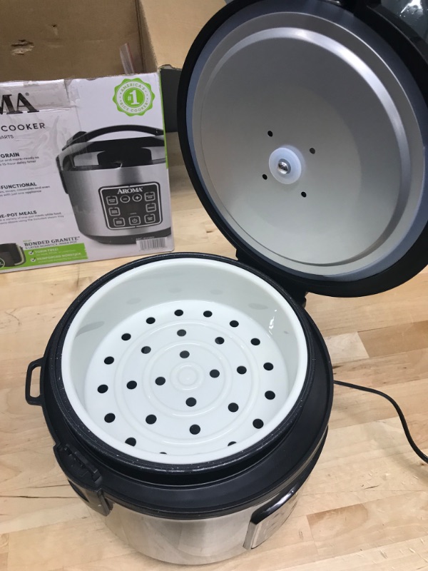 Photo 3 of USED. Aroma Housewares ARC-914SBD Digital Cool-Touch Rice Grain Cooker and Food Steamer, Stainless, Silver, 4-Cup (Uncooked) / 8-Cup (Cooked)
