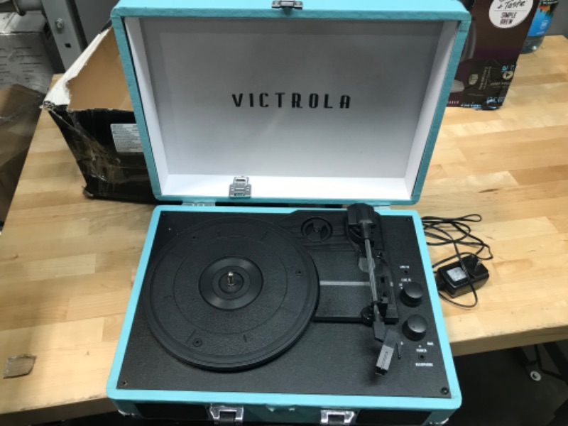 Photo 4 of USED. Victrola Vintage 3-Speed Bluetooth Portable Suitcase Record Player with Built-in Speakers | Upgraded Turntable Audio Sound| Includes Extra Stylus | Turquoise, Model Number: VSC-550BT