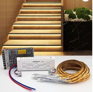 Photo 1 of ***MISSING COMPONENTS***OMIGAN Intelligent Motion Sensor LED Stair Lighting Kit KMG-3233, 40 Inch (100 cm) Long Cuttable LED Strip Light for Indoor LED Stair Lights LED Step Lights (16 Stairs, Warm White 3000K)