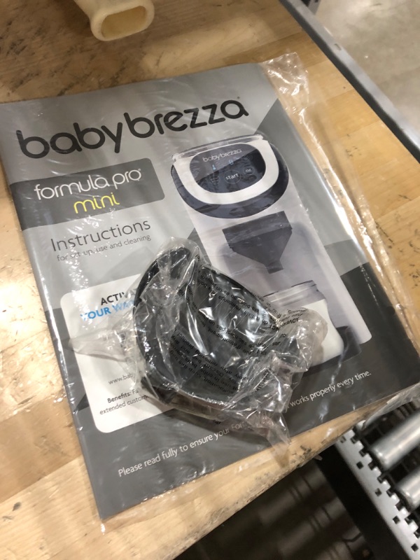 Photo 3 of Baby Brezza Formula Pro Mini Baby Formula Maker – Small Baby Formula Mixer Machine Fits Small Spaces and is Portable for Travel– Bottle Makers Makes The Perfect Bottle for Your Infant On The Go Formula Pro Mini Dispenser Machine